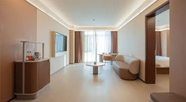 Люкс Deluxe Weihai Xingbo Business Hotel (Weihai Railway Station Hanlefang)