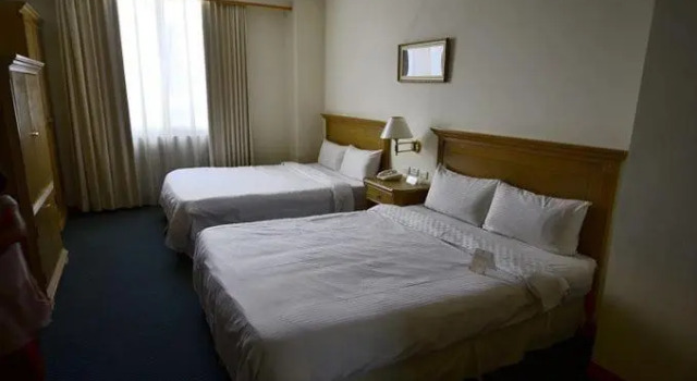 Четырёхместный номер Cambridge Hotel - Yung Kang