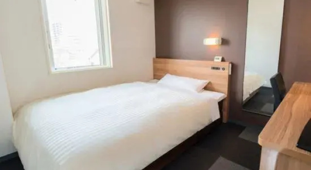 Кровать в общем номере (женский номер) Super Hotel Morioka
