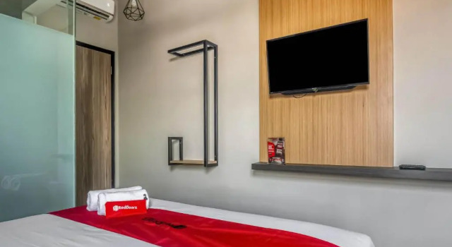 Номер Standard Sans Stay Caverna Gandaria City