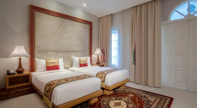 Deluxe chambre Ramada Suites By Wyndham Solo