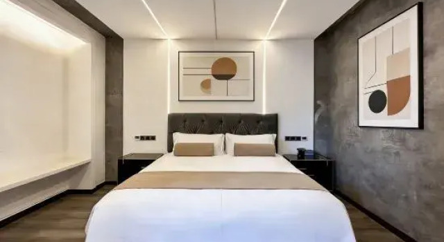 Кровать в общем номере Kangding Liwan Yabuda Hotel