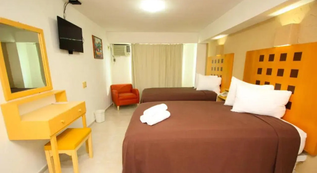 Четырёхместный номер Standard Hotel Posada del Carmen
