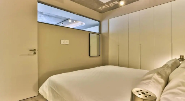 One Bedroom With Balcony and City Views
