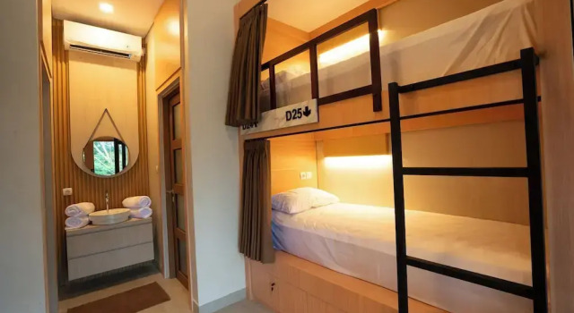 Кровать в общем номере Wanaseta Guesthouse