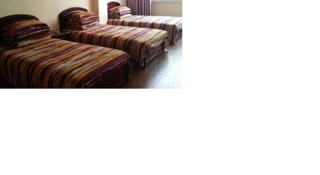 Huangchengxiangfu 404 Home Stay, Book Hotel Hoteller i Jincheng med parkering, Parkering