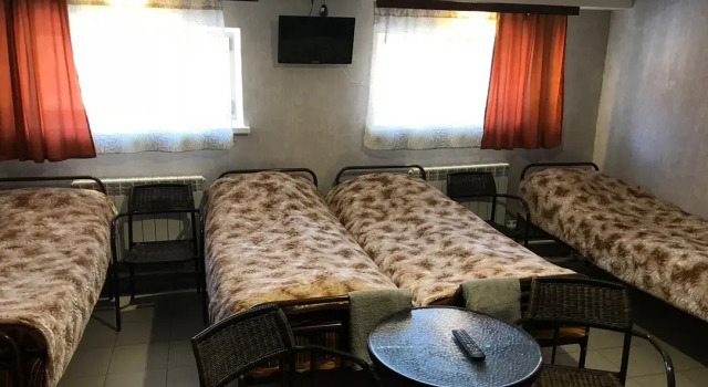 Кровать в общем номере Гостиница Аура