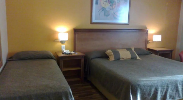 Четырёхместный номер Standard Tritone Hotel