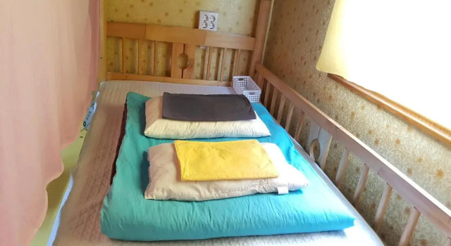 Кровать в общем номере (мужской номер) Guesthouse Spring Flower