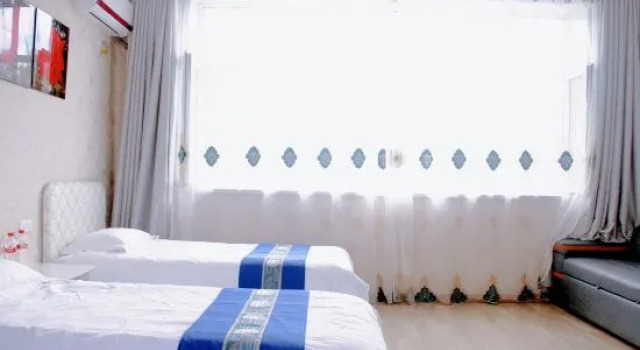 Семейный люкс Jiayin County Jiaxin hotel