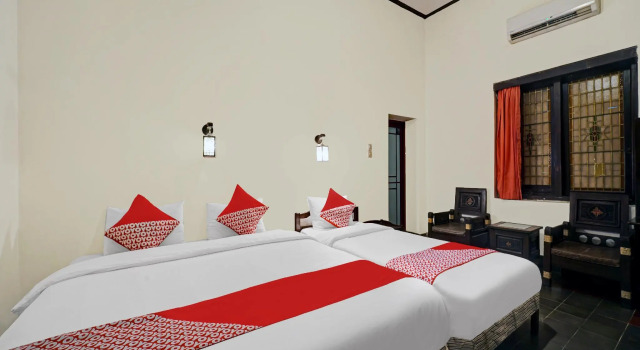 Suite OYO 90676 Oryza Hotel
