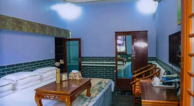Кровать в общем номере Qininn Qiaozhai Minsu Fengqing Branch