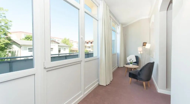 Апартаменты с 3 комнатами с балконом Appartementhaus Zum Strandkorb
