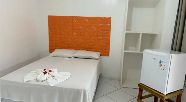 Кровать в общем номере с 6 комнатами Pousada Casa Grande