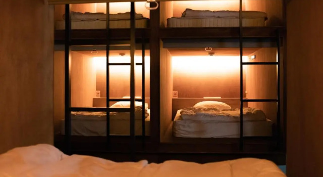 Кровать в общем номере (мужской номер) Guesthouse Sunline Beppu