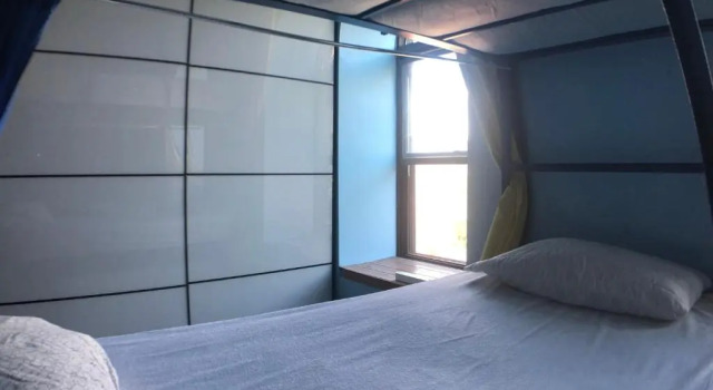 Postel ve společném pokoji Auberge Alternative