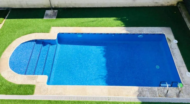Апартаменты Apartamento con piscina y terraza al lado de la playa