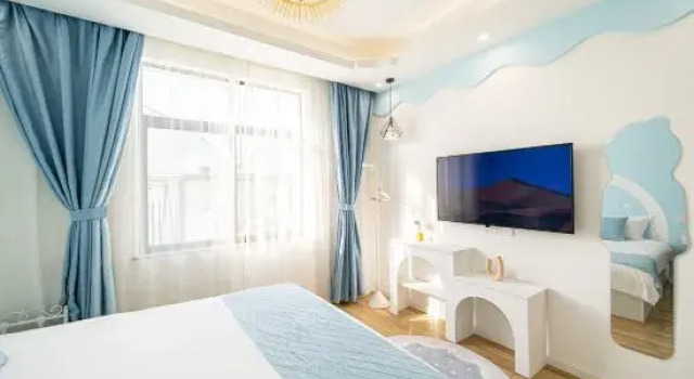 Семейный люкс Deluxe с 2 комнатами Yunian Hostel