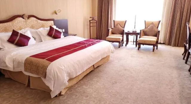Номер Deluxe Mangshi Hotel