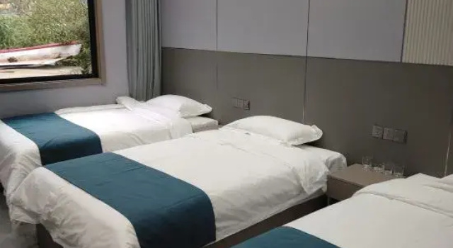 Кровать в общем номере Longxian Jinhu Grassland Homestay