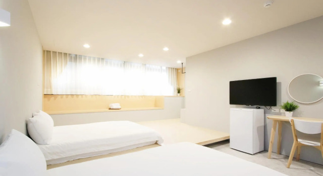 Четырёхместный номер Standard Place Inn Taipei