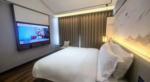 Люкс Business Moshang Qingya Hotel (Wuan Building Materials Market Cishan Street Branch)