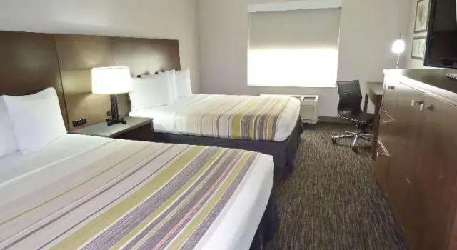 Четырёхместный номер Standard Country Inn & Suites by Radisson, Tampa-Brandon, FL