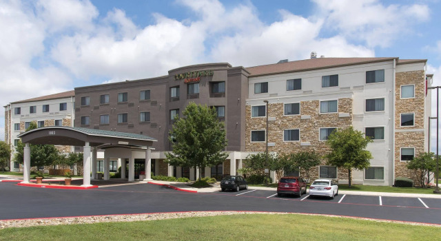 Кровать в общем номере Courtyard by Marriott San Antonio North Stone Oak At Legacy