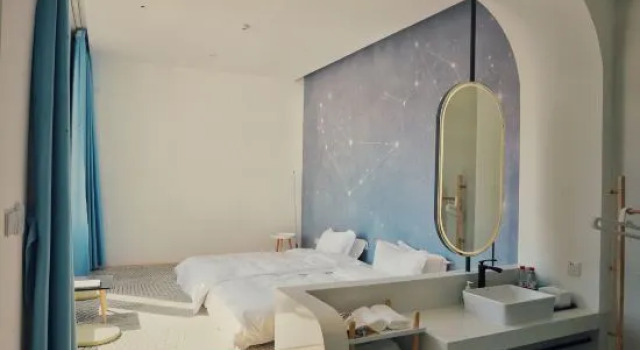 Кровать в общем номере Beijing Catree B&B