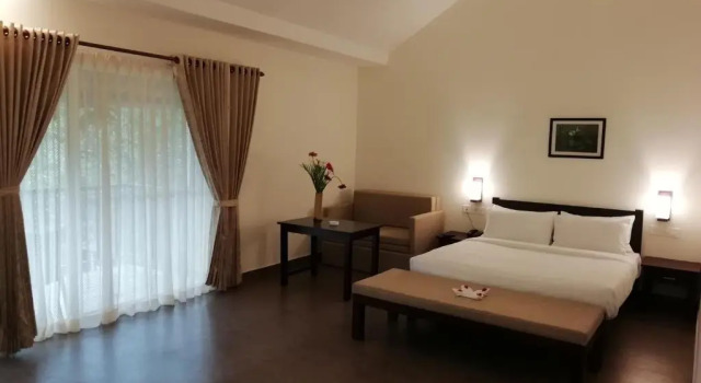 Коттедж с видом на сад Abad Brookside Wayanad