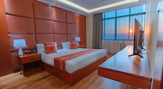 Номер Deluxe M Apartments & Hotel