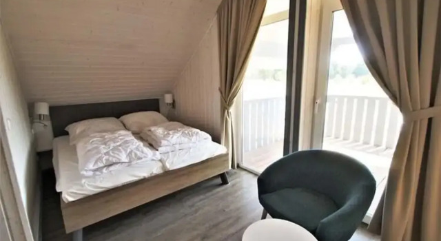 Ferienhaus im Skandinavischen Stil, Забронировать Отель Миров Мекленбургское поозёрье, рядом с Badestrand Granzow