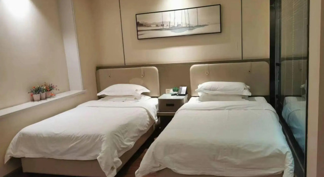 Delin Business Hotel, Prenota Hotel Mishan Heilongjiang