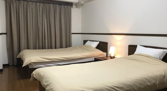 Двухместный номер Economy с балконом Weekly & Monthly City Inn Kokura