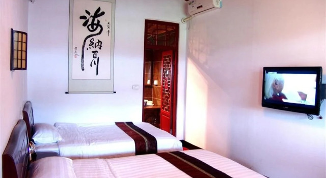Pingyao Xing Long Yi Guesthouse, Забронировать Отель Отели Пинъяо с парковкой, рядом с Ji's Old Residence, Парковка