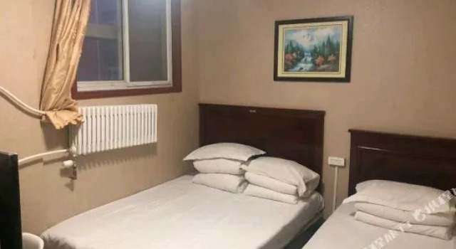 Kuaile Niandai Hotel