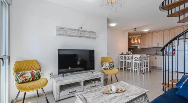 Brand new duplex in Golf del Sur, see view, Забронировать Отель Отели Сан-Мигель-де-Абона с парковкой, рядом с Playa Amarilla, Парковка