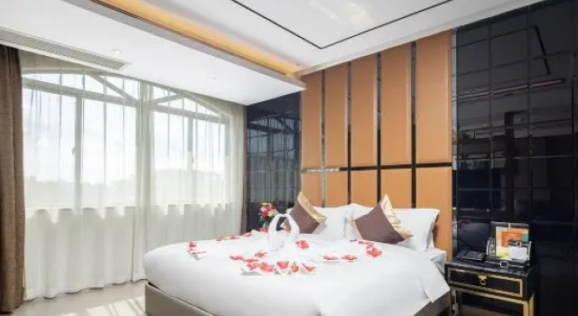 Люкс Deluxe Chengjie Business Hotel (Wanning City Center High-speed Railway Station)