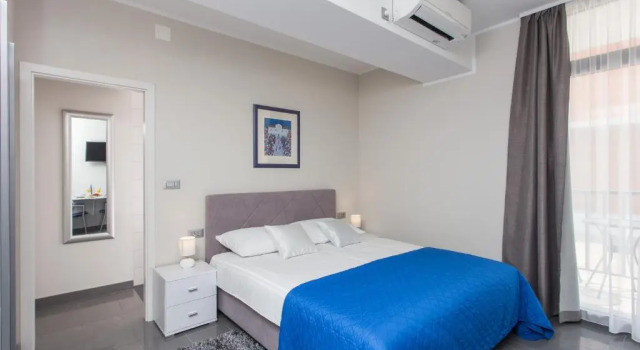 Студия Standard с балконом и с видом на город Apartments ZoomZoom