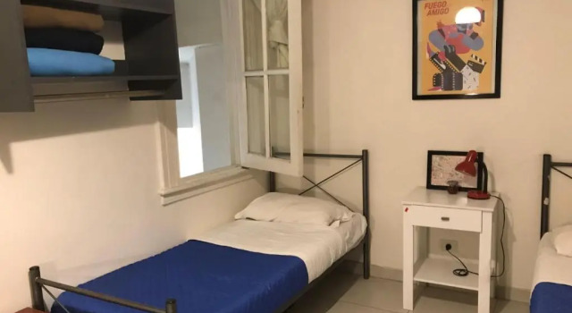 Кровать в общем номере Reina Madre Hostel