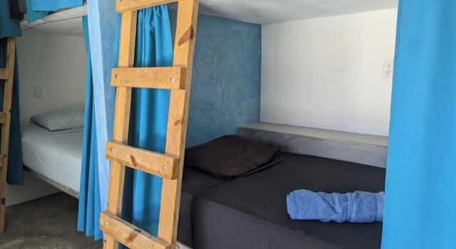 Кровать в общем номере La Ventana Hostel