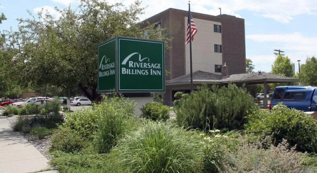 Кровать в общем номере Riversage Billings Inn