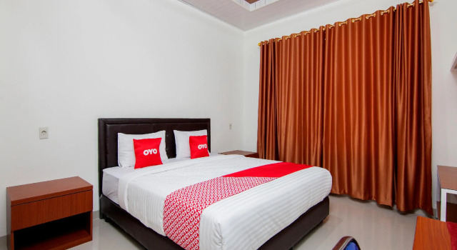 Номер Deluxe OYO 1819 Aries Hotel