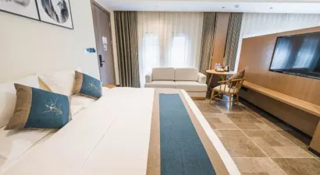 Семейный люкс Executive с 2 комнатами Songfengju Courtyard Hotel (Xingyi Wanfenglin Airport & High-speed Railway Station Branch)
