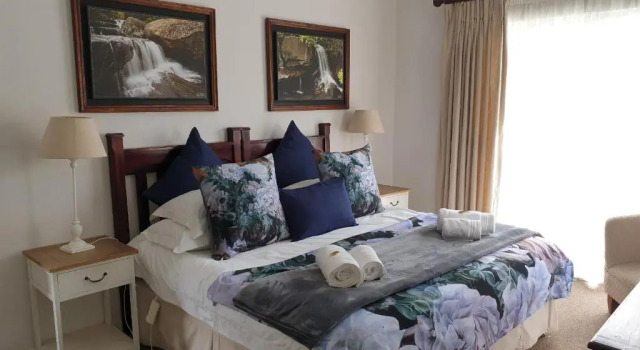 Luxo quarto Ash River Lodge B&B
