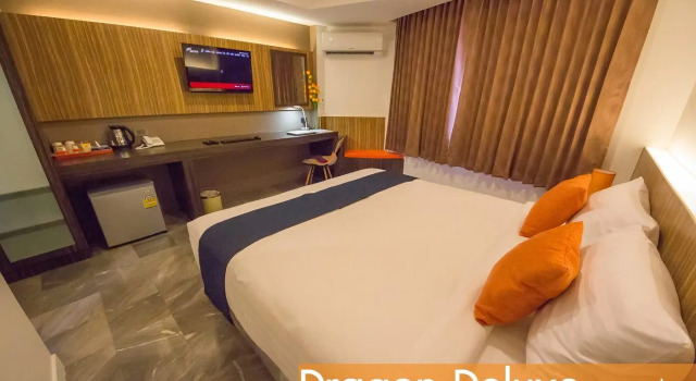 Кровать в общем номере Dragon River Avenue