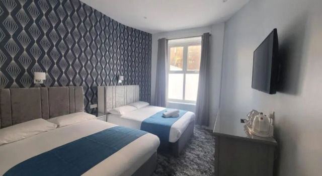 Четырёхместный номер George Hotel
