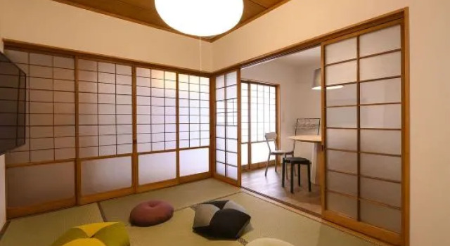 Кровать в общем номере BEYOND HOTEL Takayama 4th