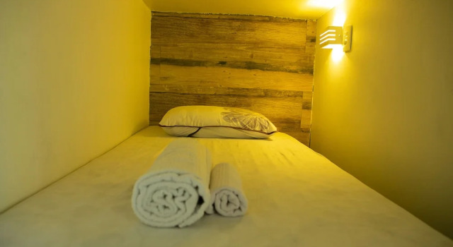 Кровать в общем номере Hostel House Santinho