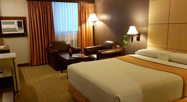 Четырёхместный номер Executive Riviera Mansion Hotel